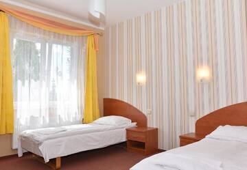 Фото номера Двухместный номер с 1 кроватью или 2 отдельными кроватями Мотели Motel Paradise г. Тожим 4