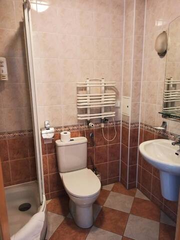 Фото номера Двухместный номер с 2 отдельными кроватями Мотели Motel Petro г. Тожим 2