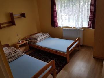 Фото номера Стандартный двухместный номер с 2 отдельными кроватями Фермерские дома Newland Wójtowicz г. Тожим 16